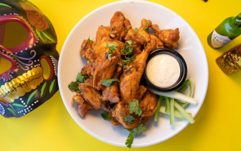 OTB Fried chicken wings tossed in maple chipotle glaze served with ranch sauce.